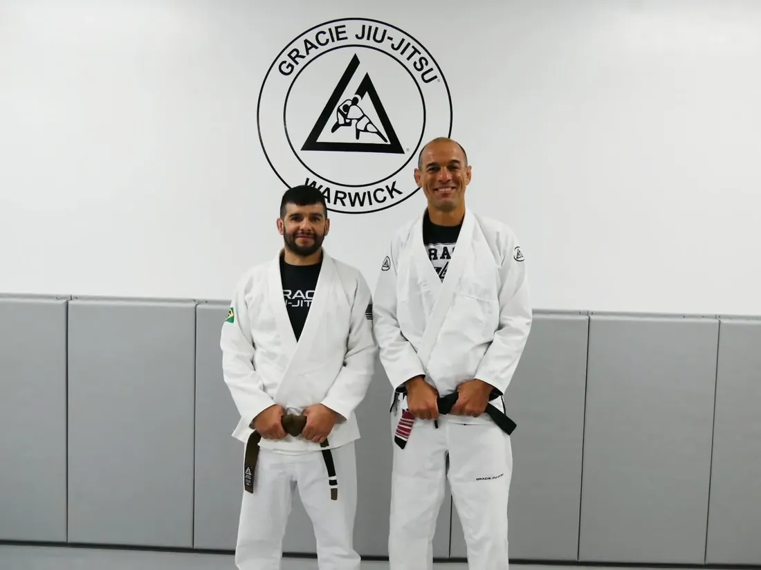 Coach Jamie Enriquez with the Gracie family at Gracie Jiu-Jitsu Warwick